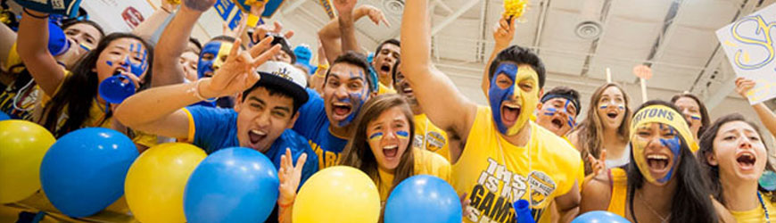 Students in blue and gold spirit apparel