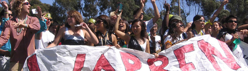 Students holding large Warren banner
